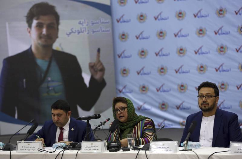 Hawa Alam Nuristani, chief of Election Commission of Afghanistan, center, speaks during a press conference at the Independent Election Commission office in Kabul, Afghanistan, February 18, 2020.  AP