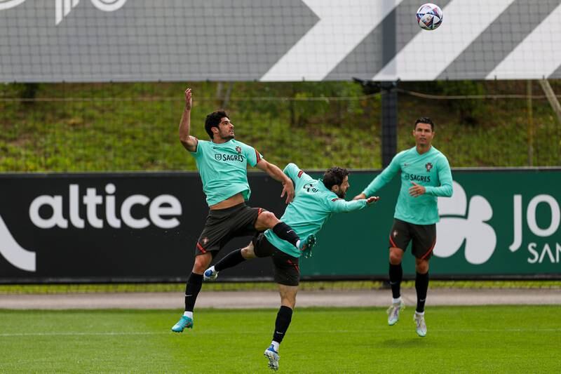 Left to right: Goncalo Guedes, Bernardo Silva and Cristiano Ronaldo during training. EPA