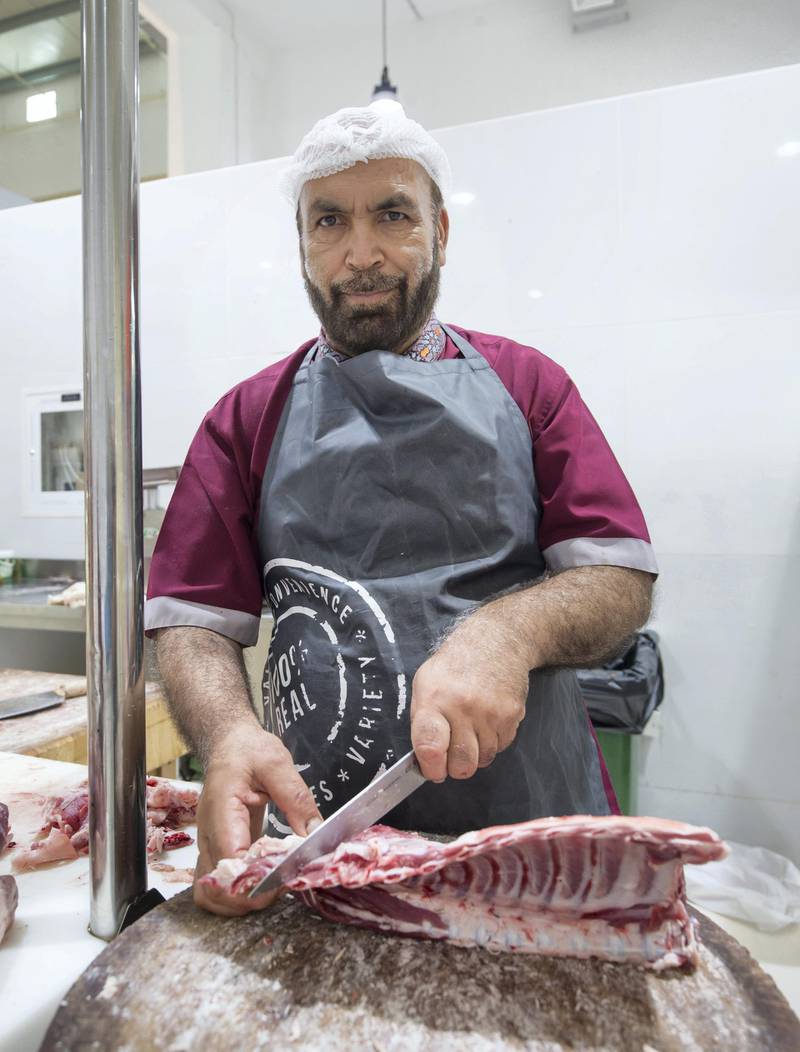 DUBAI, UNITED ARAB EMIRATES - Sibghat Ullah a meat vendor at the Waterfront Market, Deira.  Leslie Pableo for The National