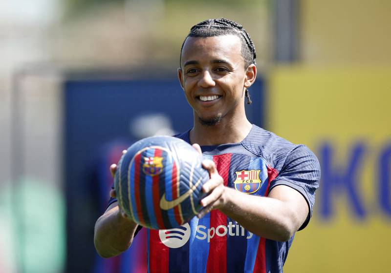 New Barcelona player Jules Kounde poses during his unveiling on Monday, August 1, 2022. Reuters