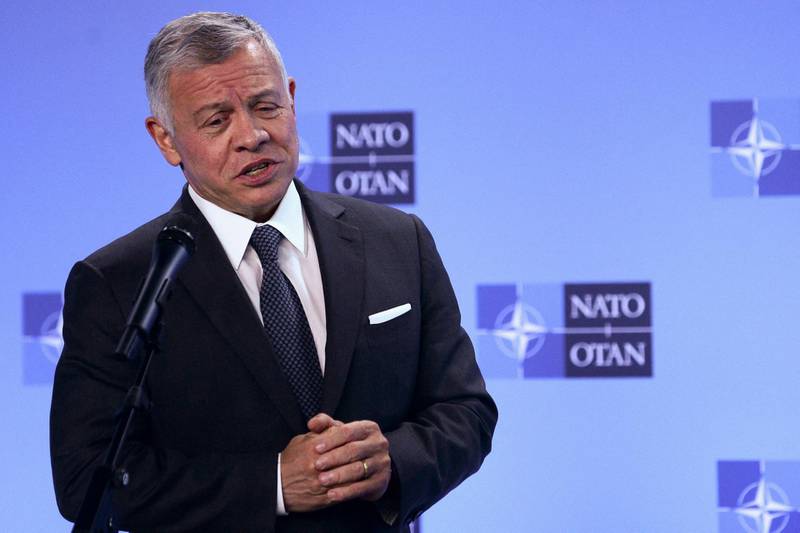 King Abdullah speaks during the news conference at the Nato Alliance's headquarters in Brussels. AFP