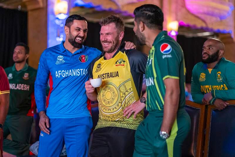 Afghanistan's Mohammad Nabi, left, Australia captain Aaron Finch and Pakistan skipper Babar Azam at the launch of the T20 World Cup in Melbourne on October 15, 2022. Getty