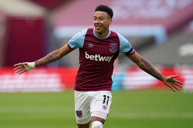 West Ham United's English midfielder Jesse Lingard celebrates scoring the opening goal during the English Premier League football match between West Ham United and Leicester City at The London Stadium, in east London on April 11, 2021. RESTRICTED TO EDITORIAL USE. No use with unauthorized audio, video, data, fixture lists, club/league logos or 'live' services. Online in-match use limited to 120 images. An additional 40 images may be used in extra time. No video emulation. Social media in-match use limited to 120 images. An additional 40 images may be used in extra time. No use in betting publications, games or single club/league/player publications.
 / AFP / POOL / John Walton / RESTRICTED TO EDITORIAL USE. No use with unauthorized audio, video, data, fixture lists, club/league logos or 'live' services. Online in-match use limited to 120 images. An additional 40 images may be used in extra time. No video emulation. Social media in-match use limited to 120 images. An additional 40 images may be used in extra time. No use in betting publications, games or single club/league/player publications.
