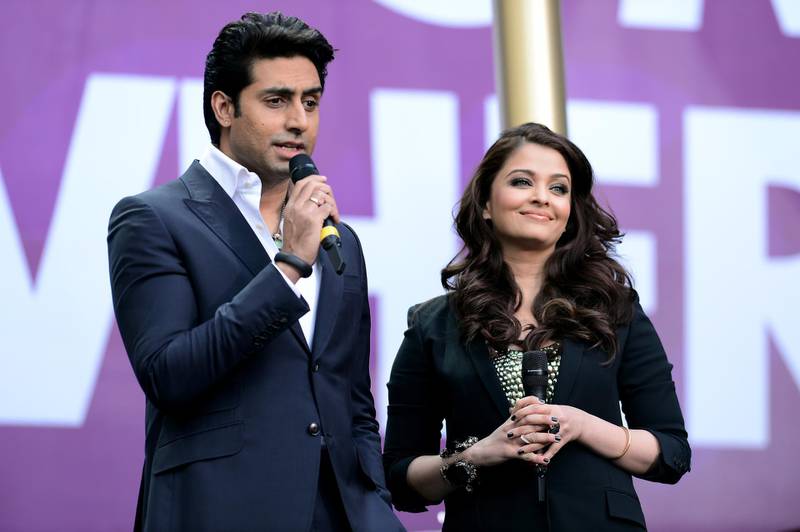 LONDON, ENGLAND - JUNE 01:  (L-R) Abhishek Bachchan and Aishwarya Rai Bachchan speak on stage at the "Chime For Change: The Sound Of Change Live" Concert at Twickenham Stadium on June 1, 2013 in London, England. Chime For Change is a global campaign for girls' and women's empowerment founded by Gucci with a founding committee comprised of Gucci Creative Director Frida Giannini, Salma Hayek Pinault and Beyonce Knowles-Carter.  (Photo by Ian Gavan/Getty Images for Gucci)
