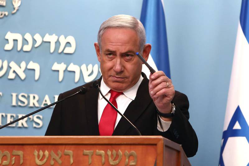 epa08294786 Israeli Prime Minister Benjamin Netanyahu gives a speech regarding the new measures that will be taken to fight the Corona virus in Israel, at his Jerusalem office, 14 March 2020. Netanyahu said Israel would shut down eateries, shopping centres and gyms in a bid to halt the spread of coronavirus. Netanyahu also said he would ask the government's approval in the upcoming cabinet meeting set to be held via video conference to allow "technologies used in the war against terror" to be used to track the movements of Israelis with coronavirus.  EPA/GALI TIBBON / POOL