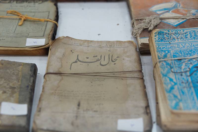 Books retrieved after the ISIS attack. Some of the most valuable titles pillaged from the library were sold on the black market. AFP