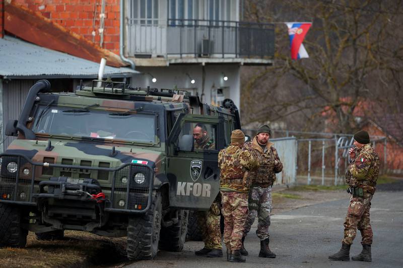 Members of the Italian Armed Forces on guard in Rudare. Reuters