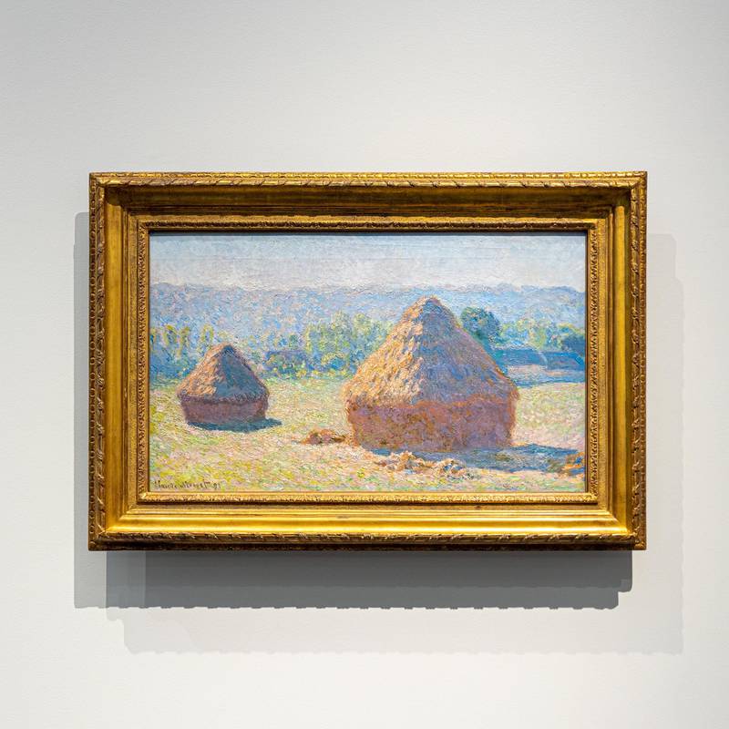 'Haystacks, End of Summer' by Claude Monet (1891) is on loan from Musee d'Orsay. It prefigures the French artist’s famous series of the Rouen Cathedral and Charing Cross Bridge in London, and further cements the artist's Impressionist style. Monet painted a series of haystacks over the years to study how light changed during the day and the seasons. Courtesy DCT Abu Dhabi