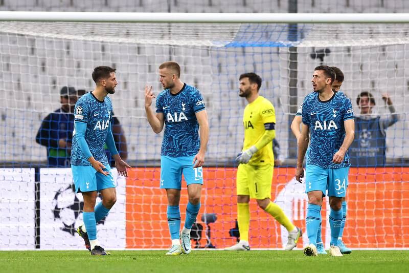 Tottenham players look dejected after Marseille's first-half goal. Getty