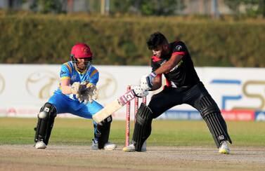 Usman Khan of Sharjah playing a shot during the Emirates D50, domestic 50-over competition held at Ajman Malek Ovals cricket ground in Ajman. Pawan Singh / The National