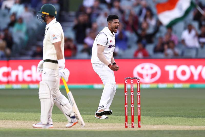 ADELAIDE, AUSTRALIA - DECEMBER 18: Umesh Yadav of India celebrates taking the wicket of Marnus Labuschagne of Australia during day two of the First Test match between Australia and India at Adelaide Oval on December 18, 2020 in Adelaide, Australia. (Photo by Ryan Pierse/Getty Images)