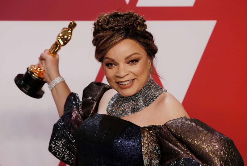 Black Panther's Ruth Carter with her Best Costume Design award for 'Black Panther.' Reuters