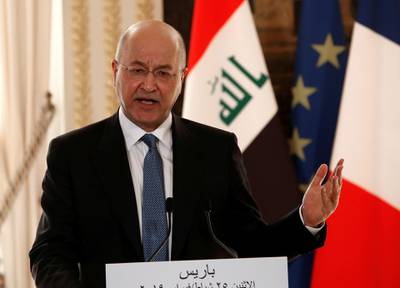 FILE PHOTO: Iraqi President Barham Salih speaks during a news conference at the Elysee Palace in Paris, France, February 25, 2019. Christophe Ena/Pool via REUTERS/File Photo