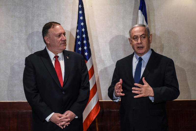US Secretary of State Mike Pompeo (L) meets Israeli Prime Minister Benjamin Netanyahu (R) on December 4, 2019 in Lisbon. / AFP / POOL / PATRICIA DE MELO MOREIRA
