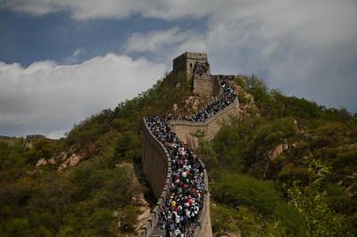 People visit the Great Wall during the labour day holiday in Beijing on May 1, 2021. (Photo by Noel Celis / AFP)