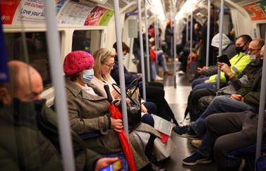 People ride a tube train as the spread of the coronavirus disease (COVID-19) continues, in London, Britain, December 15, 2020. REUTERS/Henry Nicholls