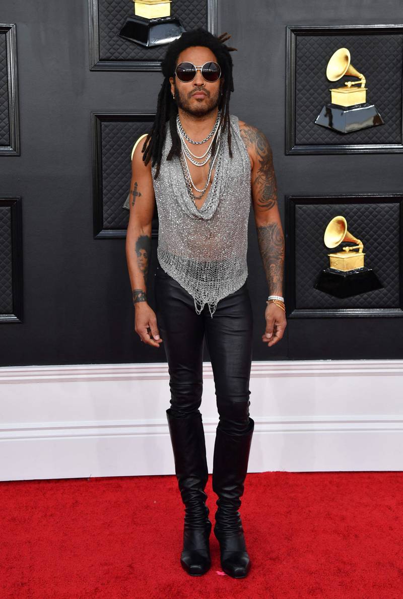 Lenny Kravitz, wearing a silver top and leather trousers. AFP