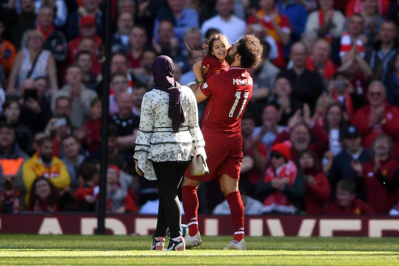 Mohamed Salah with his daughter and wife following the Premier League match between Liverpool and Wolverhampton Wanderers. Getty Images