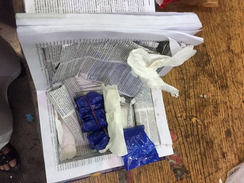 Dubai Police released this image of drugs in a hollowed out book. It was part of a consignment of two tonnes of drugs of various types. A multinational police operation tackled criminal activities related to drug smuggling and trafficking in Denmark, Holland, Switzerland, Italy, Spain and Austria in November 2017. Photo: Dubai Police