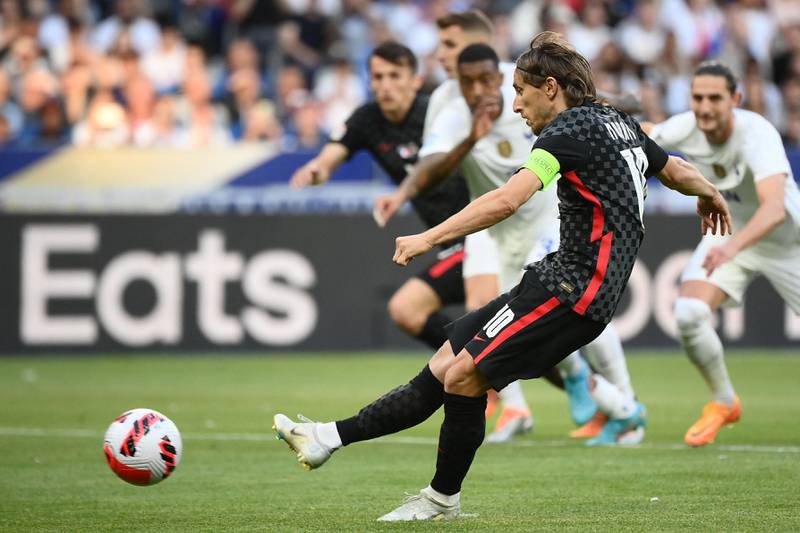 Croatia midfielder Luka Modric scores from the penalty spot against France. AFP
