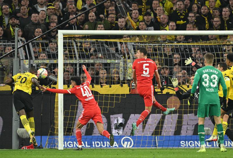 Anthony Modeste scores Dortmund's second goal in the 2-2 draw with Bayern Munich. AFP