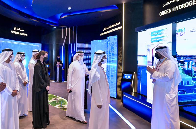 Sheikh Mohammed tours the Dubai Electricity and Water Authority pavilion.