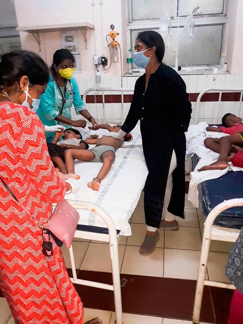 Staff attend to children affected by a gas leak from LG Polymers plant at the King George hospital in Visakhapatnam. AFP