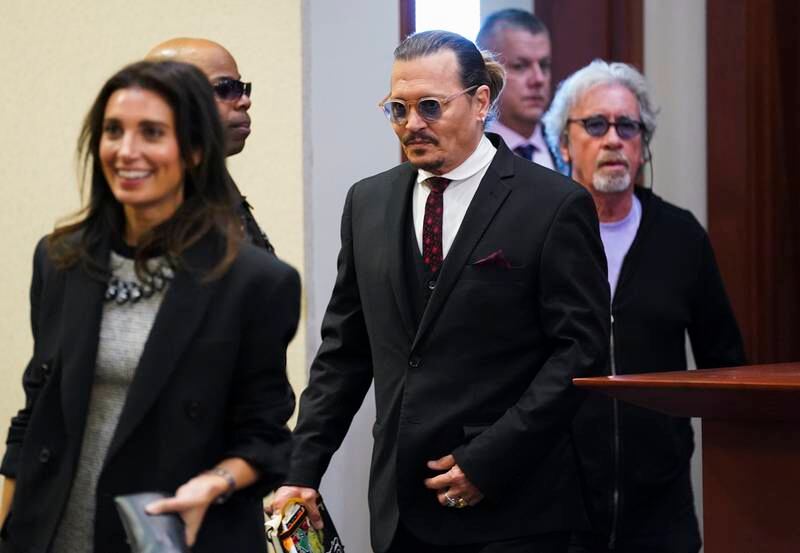 Depp walks into the courtroom for Day 17 of testimony. AP
