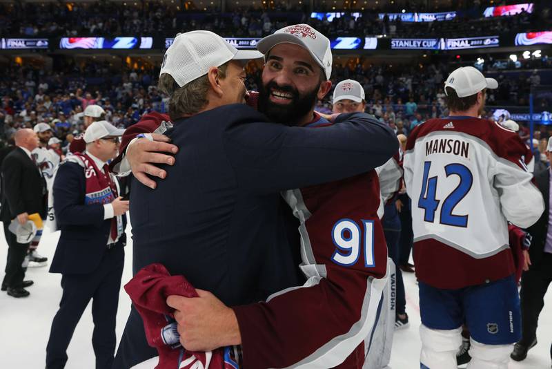  Kadri hugs Avalanche general manager Joe Sakic after their Stanley Cup victory. AFP
