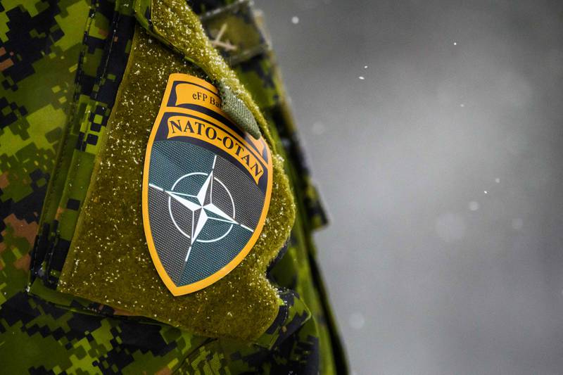 The Nato logo on a uniform during the bloc's annual military exercise 'Winter Shield' in Adazi, Latvia, in November 2021. AFP