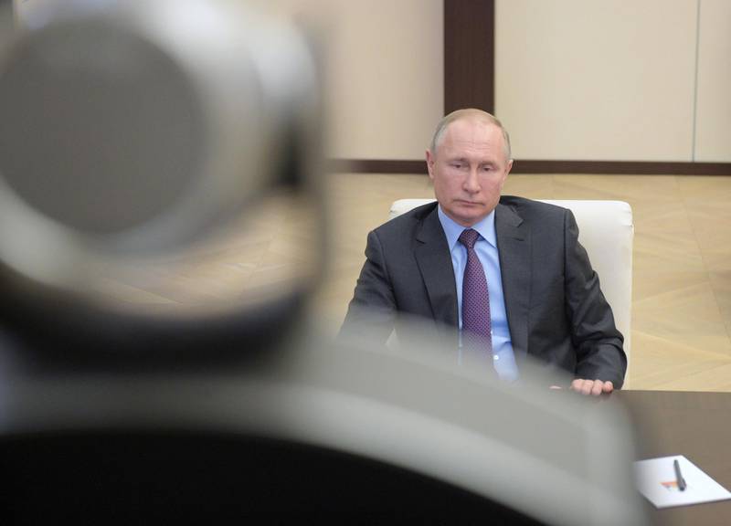 Russian President Vladimir Putin attends a meeting on global energy markets via a video link at his residence outside Moscow, Russia April 3, 2020. Sputnik/Alexei Druzhinin/Kremlin via REUTERS  ATTENTION EDITORS - THIS IMAGE WAS PROVIDED BY A THIRD PARTY.