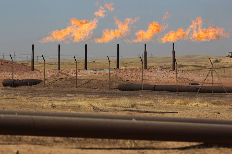 Gas flares burn at the Bai Hassan oil field, west of the multi-ethnic northern Iraqi city of Kirkuk. AFP