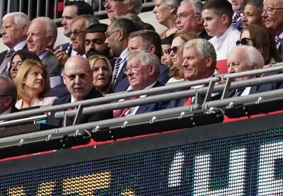 Manchester United co-chairman Avram Glazer, left, and Sir Alex Ferguson at the Wembley Stadium. PA