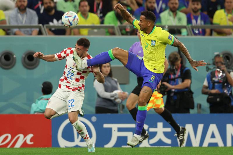 Brazil's Danilo catches Croatia's Josip Juranovic with a high challenge. AFP