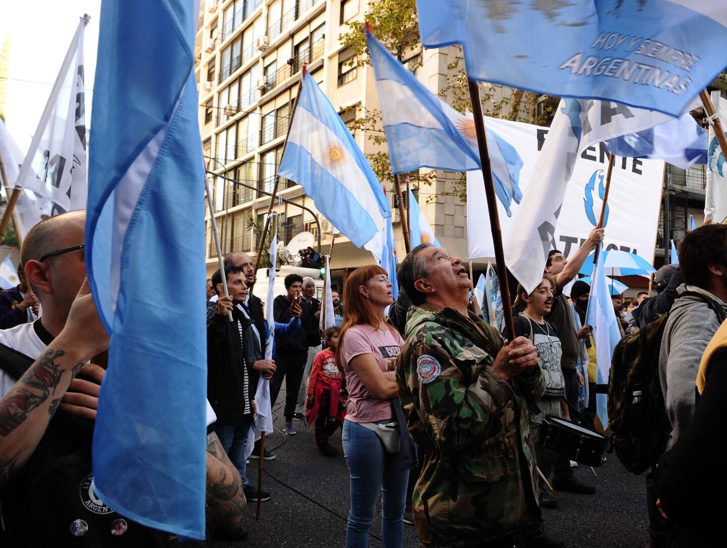Dozens of people demonstrate outside the British embassy in Buenos Aires during the 40th anniversary of the Falklands war. EPA