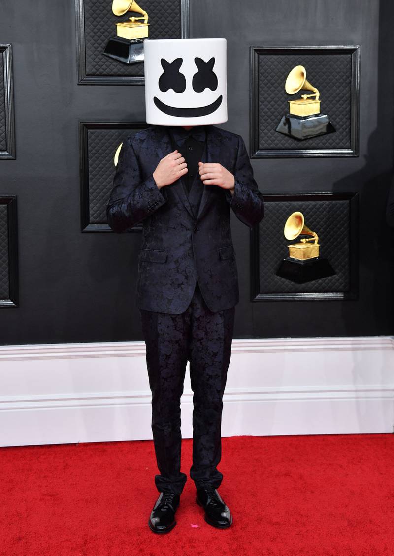 Marshmello, wearing a black suit and his famed mask. AFP