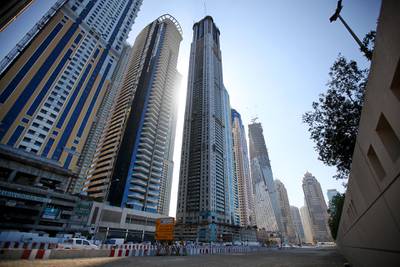 United Arab Emirates - Dubai - January 3, 2011.

BUSINESS: Construction crews work on skyscrapers dotting the north end of the Dubai Marina on Monday, January 3, 2011. Amy Leang/The National