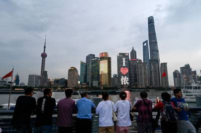 The Bund promenade in Shanghai. China's economy grew at a slower-than-expected pace in the second quarter. AFP