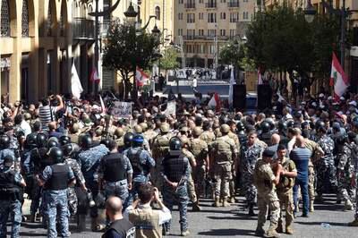 Lebanese army soldiers clash with protesters. EPA