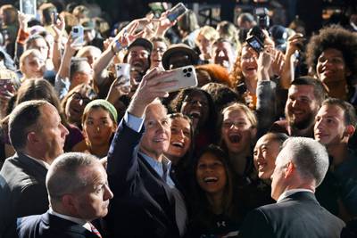 US President Joe Biden, centre, poses for a selfie with supporters during a rally for Democratic candidates, including New York Governor Kathy Hochul, at Sarah Lawrence College in Bronxville, New York. AFP