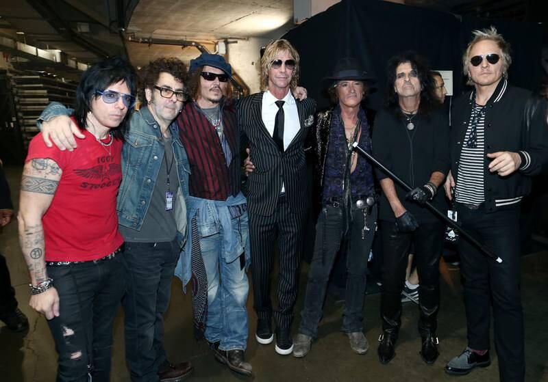 Musicians Tommy Henriksen, Witkin, Depp, Duff McKagan, Joe Perry, Alice Cooper and Matt Sorum of the Hollywood Vampires backstage at The 58th Grammy Awards in Los Angeles, California.  Getty