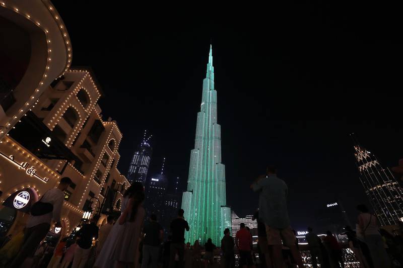 Burj Khalifa and Dubai Fountain lit up with new Eid light show in Dubai on May 11,2021. Pawan Singh / The National