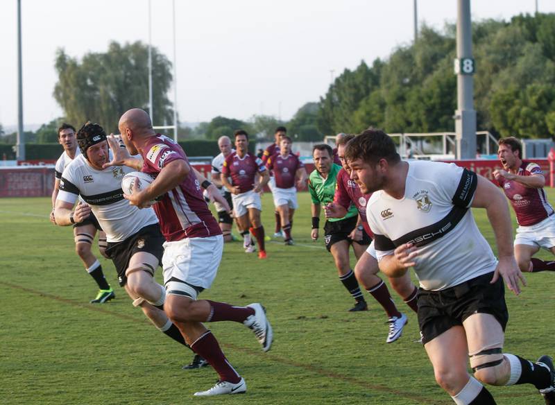 Dubai, UAE, September 23, 2016. (maroon) Caine Elisara of Team Doha tries to get pass through the Dubai Exiles defense at the West Asia Premiership, Dubai Exiles v Doha, first match of the season played at The Sevens, Dubai.
Victor Besa for The National
ID: 40806
Business
Reporter: Paul Radley
ID: 54259 *** Local Caption ***  VB_092316_sp-rugby-11.jpg