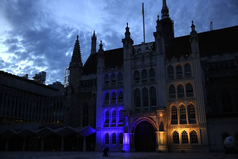 The Guildhall in London lit up with the colours of the Ukrainian flag. Getty Images