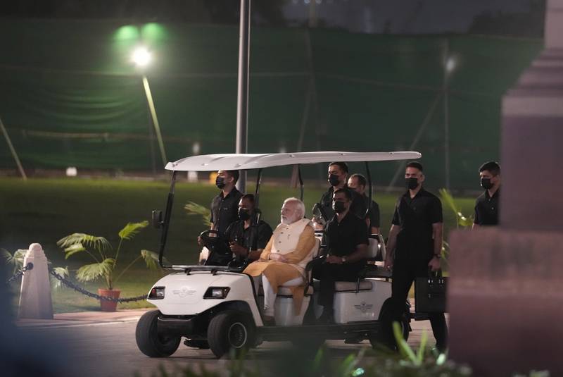 Indian Prime Minister Narendra Modi is driven along the revamped Central Vista Avenue near the India Gate in New Delhi. AP Photo