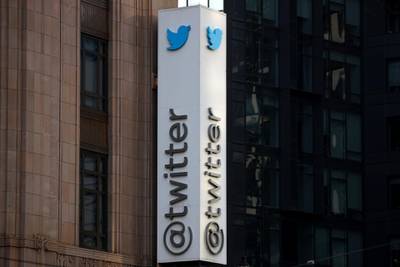 FILE PHOTO: A Twitter logo is seen outside the company headquarters, during a purported demonstration by supporters of U.S. President Donald Trump to protest the social media company's permanent suspension of the President's Twitter account, in San Francisco, California, U.S., January 11, 2021. REUTERS/Stephen Lam/File Photo