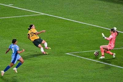 England goalkeeper Mary Earps saves from Australia's forward Sam Kerr. AFP
