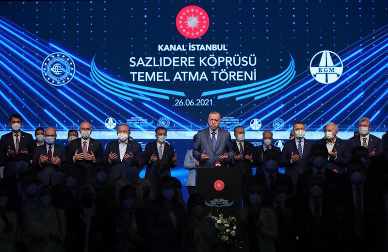 Turkish President Recep Tayyip Erdogan prays during the ground-breaking ceremony of Sazlidere Bridge in Istanbul on June 26, 2021. Reuters