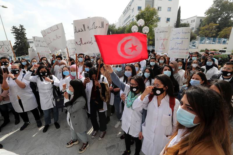 Young Tunisian doctors demand better working conditions in front of the Ministry of Health in Tunis. The March 2021 protest was sparked by the death at a regional hospital of a young doctor who fell in an elevator. EPA