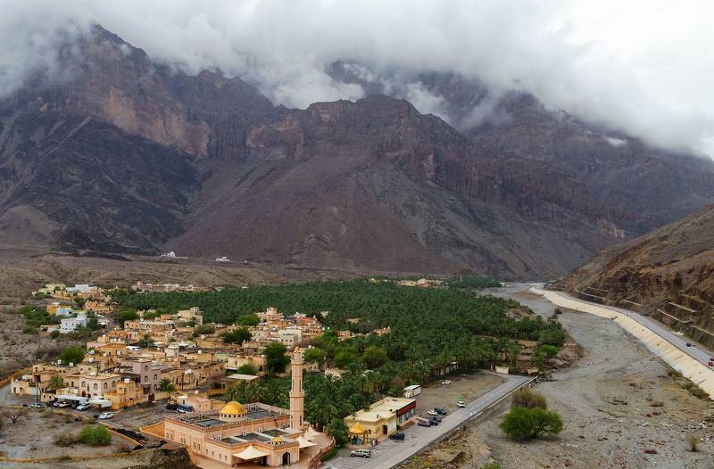 Low cloud hangs over a town